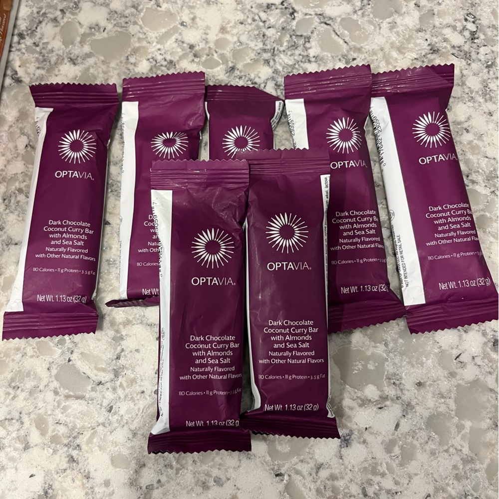 OPTAVIA DARK CHOCOLATE COCONUT CURRY BAR WITH ALMONDS & SEA SALT. 7 bars total.